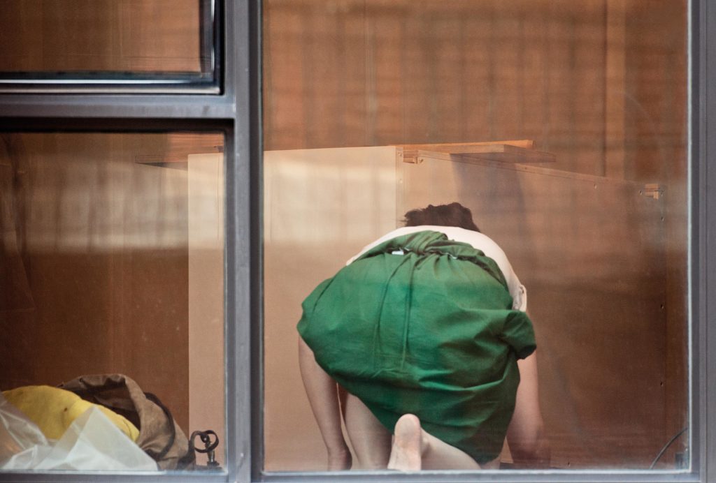 The Neighbours - Women crouched green skirt