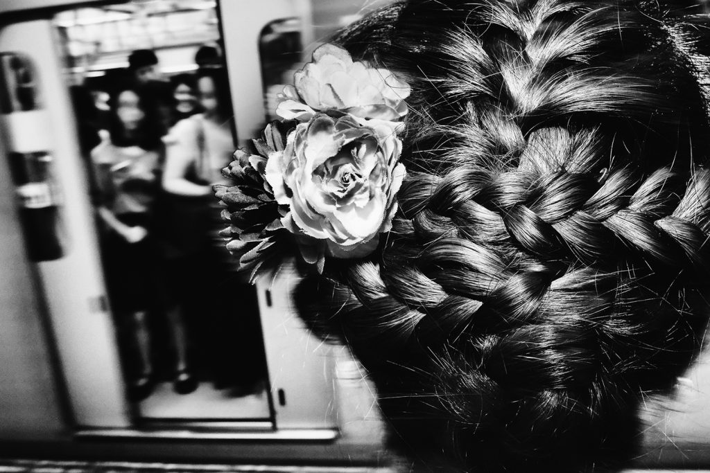 The back of the head of a Subway Commuter at Jimbocho Station